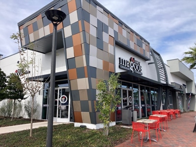 Huey Magoo’s end-cap restaurant location during the day